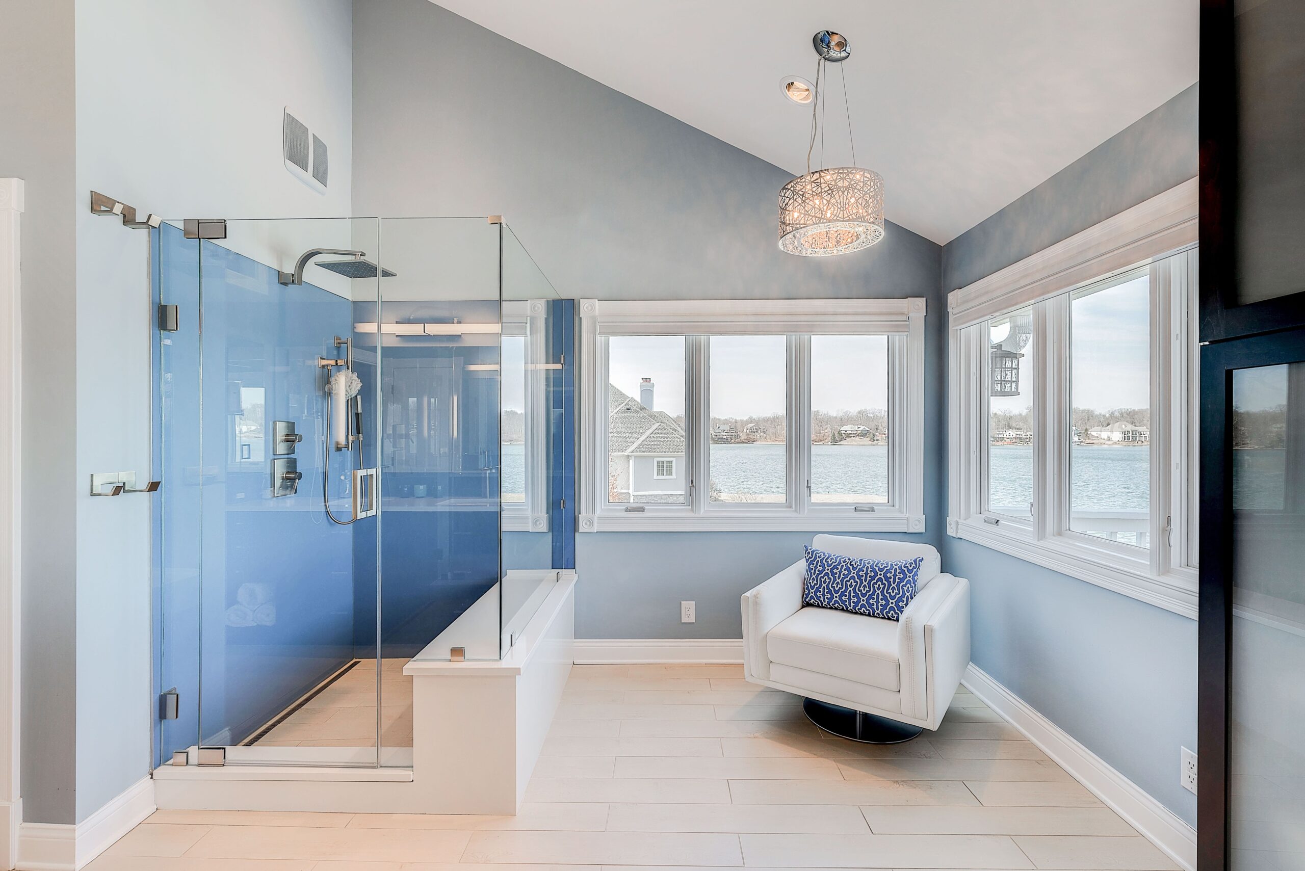 Clear glass shower room with seaside view